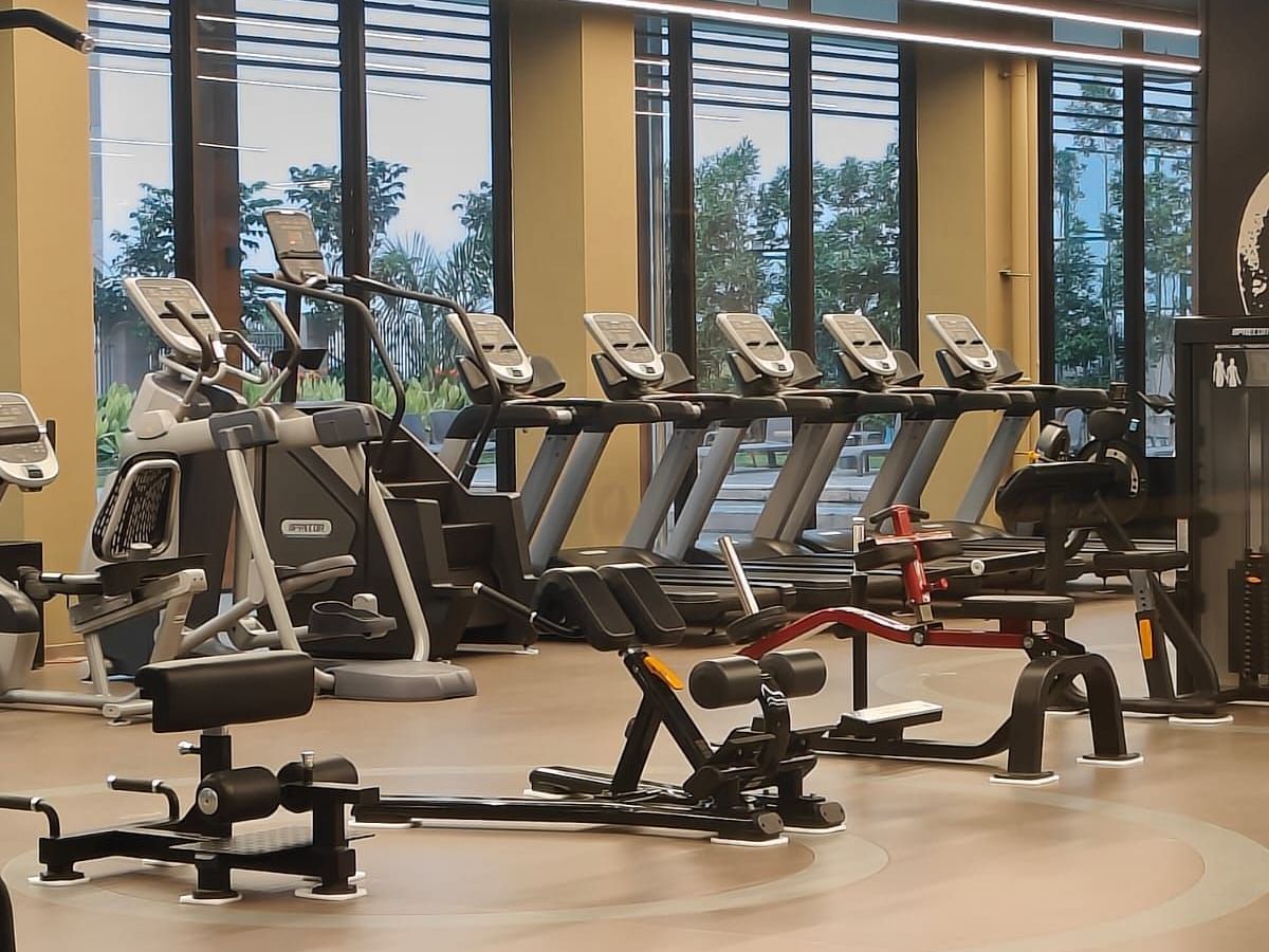 close up image of the various fitness equipment placed in the gym at club charholi, pune
